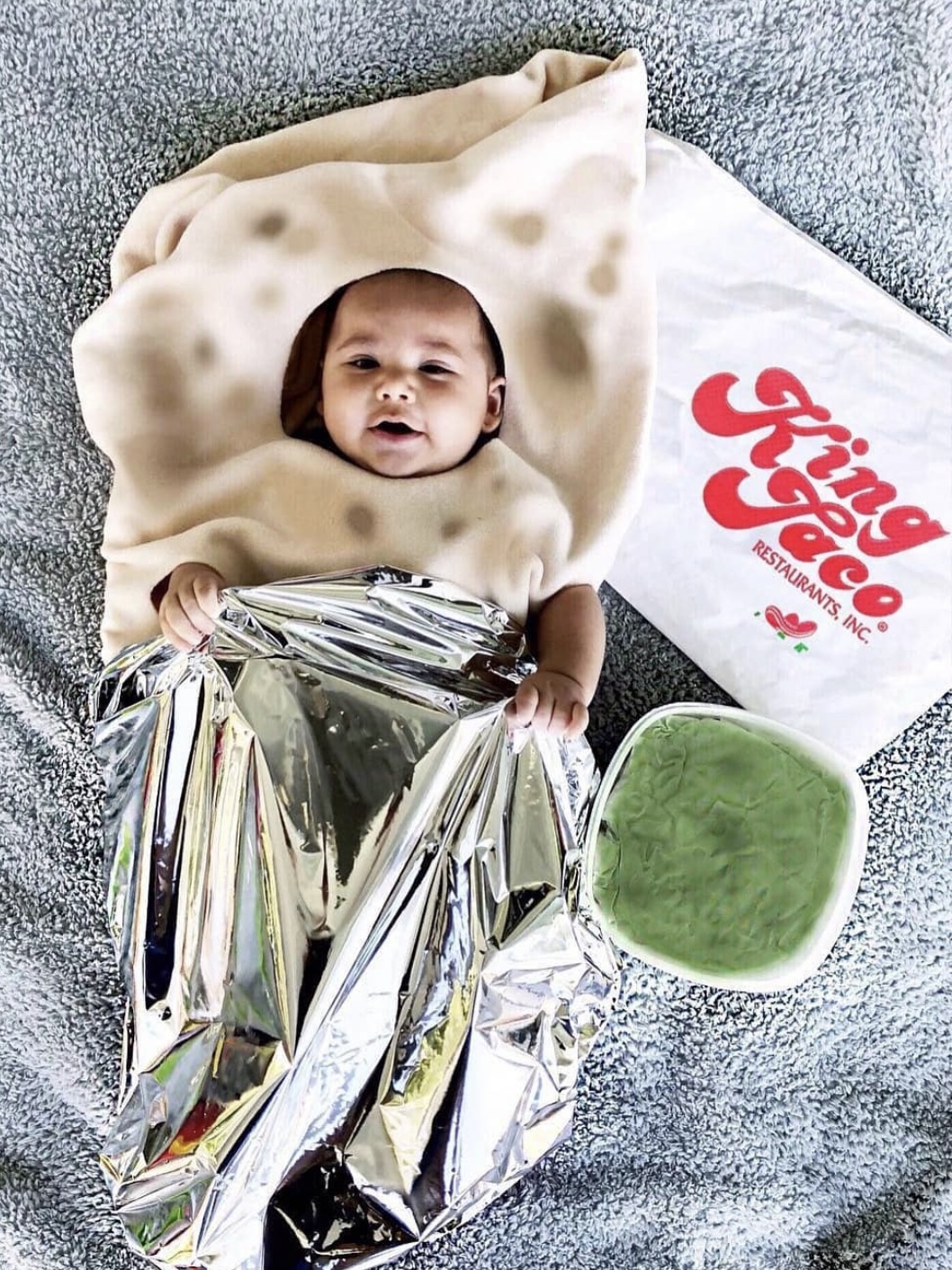 Baby dressed up as King Taco Burrito